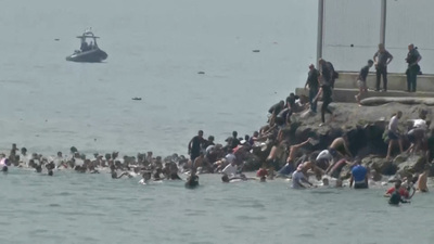 Photo: Newspim Thousands of Migrants Cross From Morocco Into Spain's Enclave of Ceuta